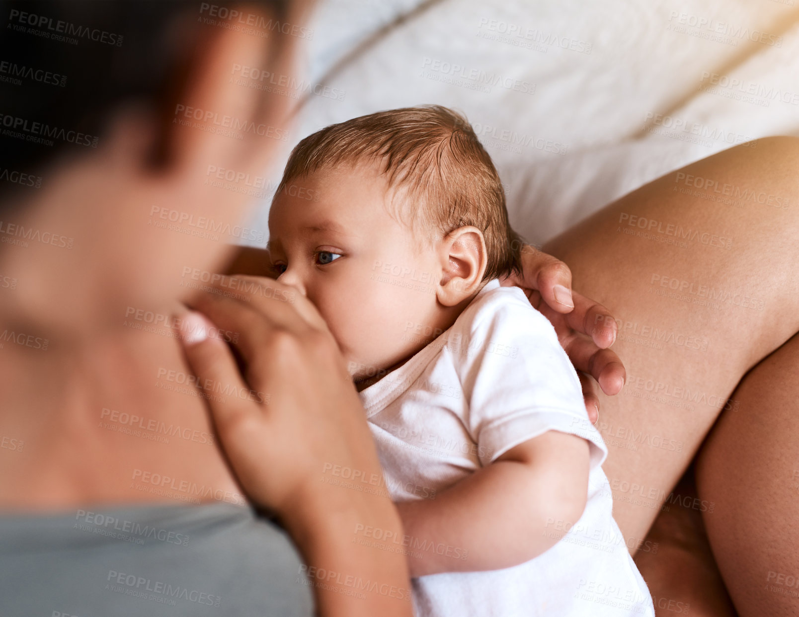 Buy stock photo Mother, baby and breastfeeding with care in bedroom for growth development, nutrition or digestive health. Top view, infant and woman with newborn child for natural milk, wellness or bonding in home