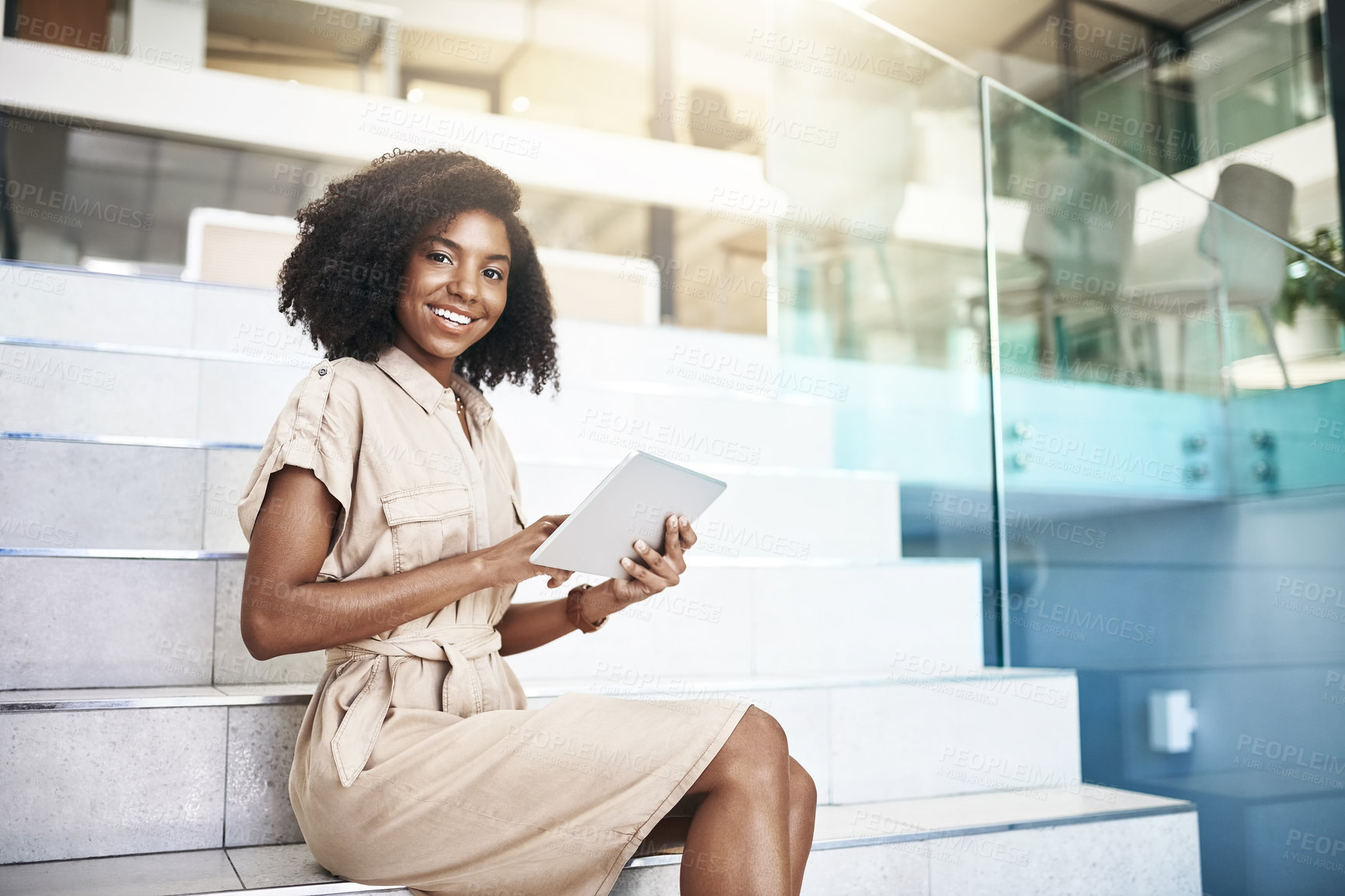 Buy stock photo Corporate, portrait and tablet with black woman on steps in agency office for online research. App, smile and technology with happy business employee reading information in professional workplace