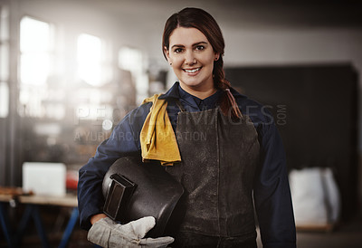Buy stock photo Cropped portrait of an attractive young creative female artisan standing in her workshop with her helmet tucked under her arm