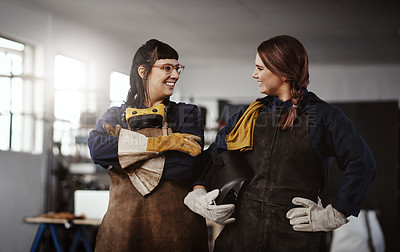 Buy stock photo Cropped shot of two attractive young female artisans standing in their workshop