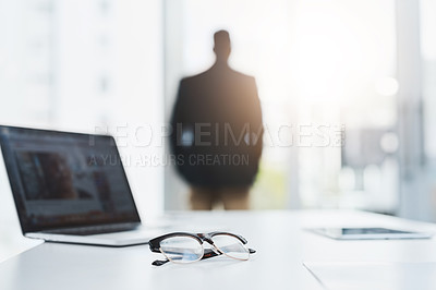 Buy stock photo Business, silhouette and man with glasses, laptop and sunshine with corporate professional, financial adviser and accountant. Person, employee and broker with computer, eyewear and economic analyst