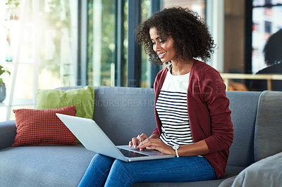 Buy stock photo Black woman, home and smile on sofa with laptop for remote work as freelance writer or blogger. Female person, employee and happy as journalist with lifestyle blog, article and story for magazine