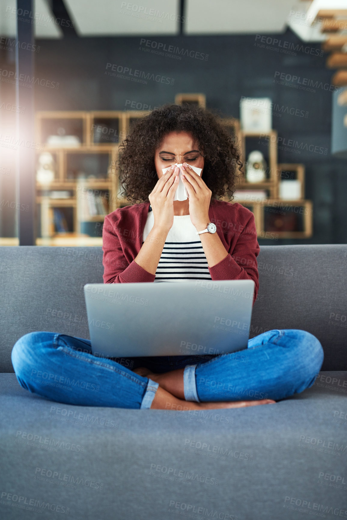 Buy stock photo Sick, laptop and woman on sofa blowing nose for flu, sinus or viral infection in living room. Lens flare, copywriter and female person with tissue for remote work, allergies or sinusitis in home