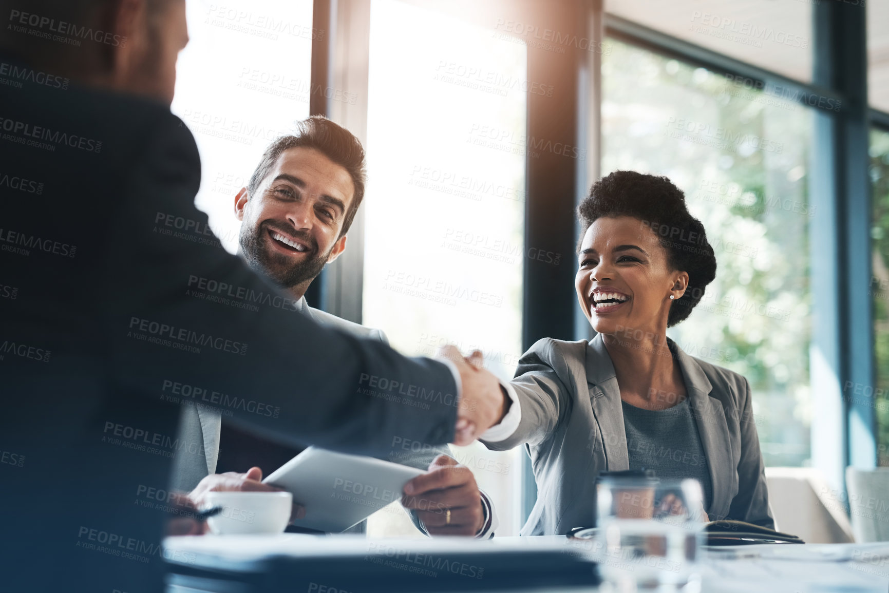 Buy stock photo Happy business people, handshake and meeting in teamwork for partnership or collaboration in boardroom. Woman person shaking hands in team recruiting, introduction or b2b agreement at the workplace