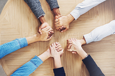 Buy stock photo Above, teamwork or business people holding hands for support, team building or community in office. Motivation, trust or employees in group collaboration with diversity or mission for goals together