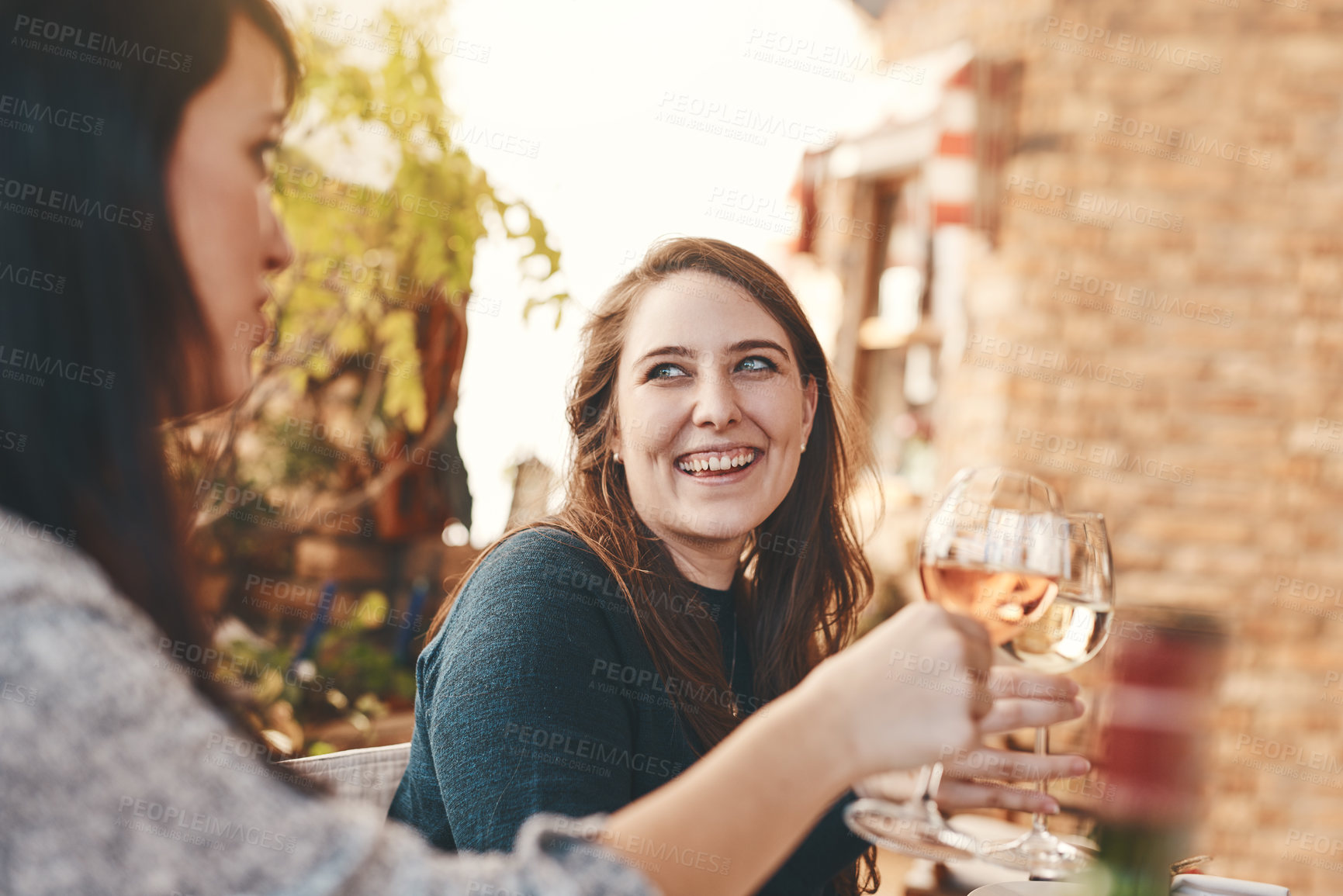 Buy stock photo Wine, women or friends toast in celebration of friendship loyalty, trust or support at an outdoor social event. Smile, cheers and happy people drinking luxury champagne enjoy relaxing at a restaurant