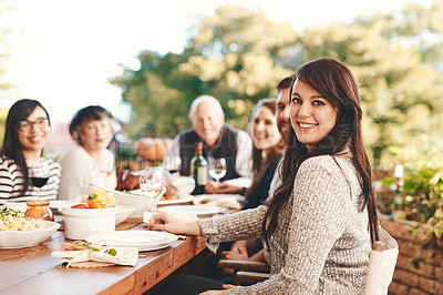 Buy stock photo Happy woman, family and food outdoor at patio table for thanksgiving or Christmas celebration wine, alcohol and meal for dinner or lunch. Portrait of a female with friends group to celebrate holiday