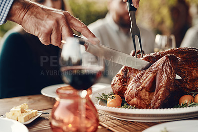 Buy stock photo Man cut turkey, chicken and food for thanksgiving, christmas and family lunch, dinner table setting or party, celebration and meal in home. Hands, knife and carving meat, poultry and feast for dining