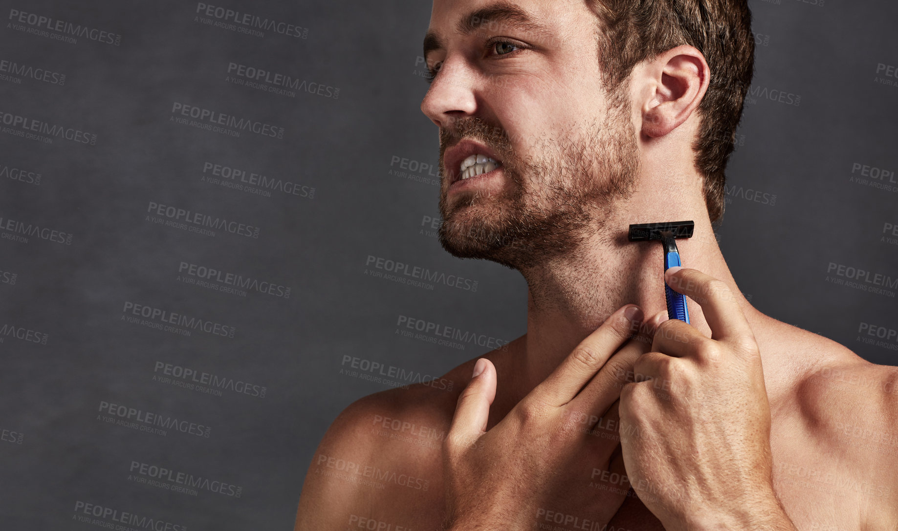 Buy stock photo Shaver, hurt or man in studio with pain or hair removal for skincare tools, face grooming or cosmetics. Uncomfortable, rough irritation or model on grey background for razor, shaving neck or wellness