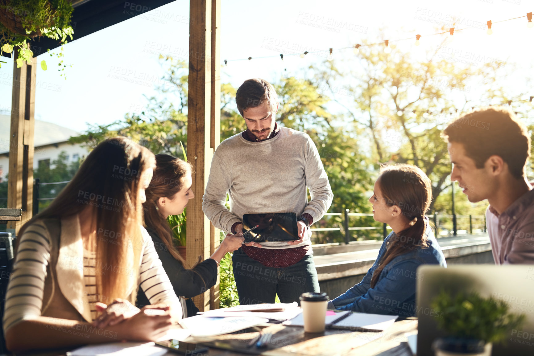 Buy stock photo Group, business people or presentation at coffee shop with tablet for discussion or remote work ideas on screen. Tech, team and meeting at cafe for planning or learning with creative campaign manager