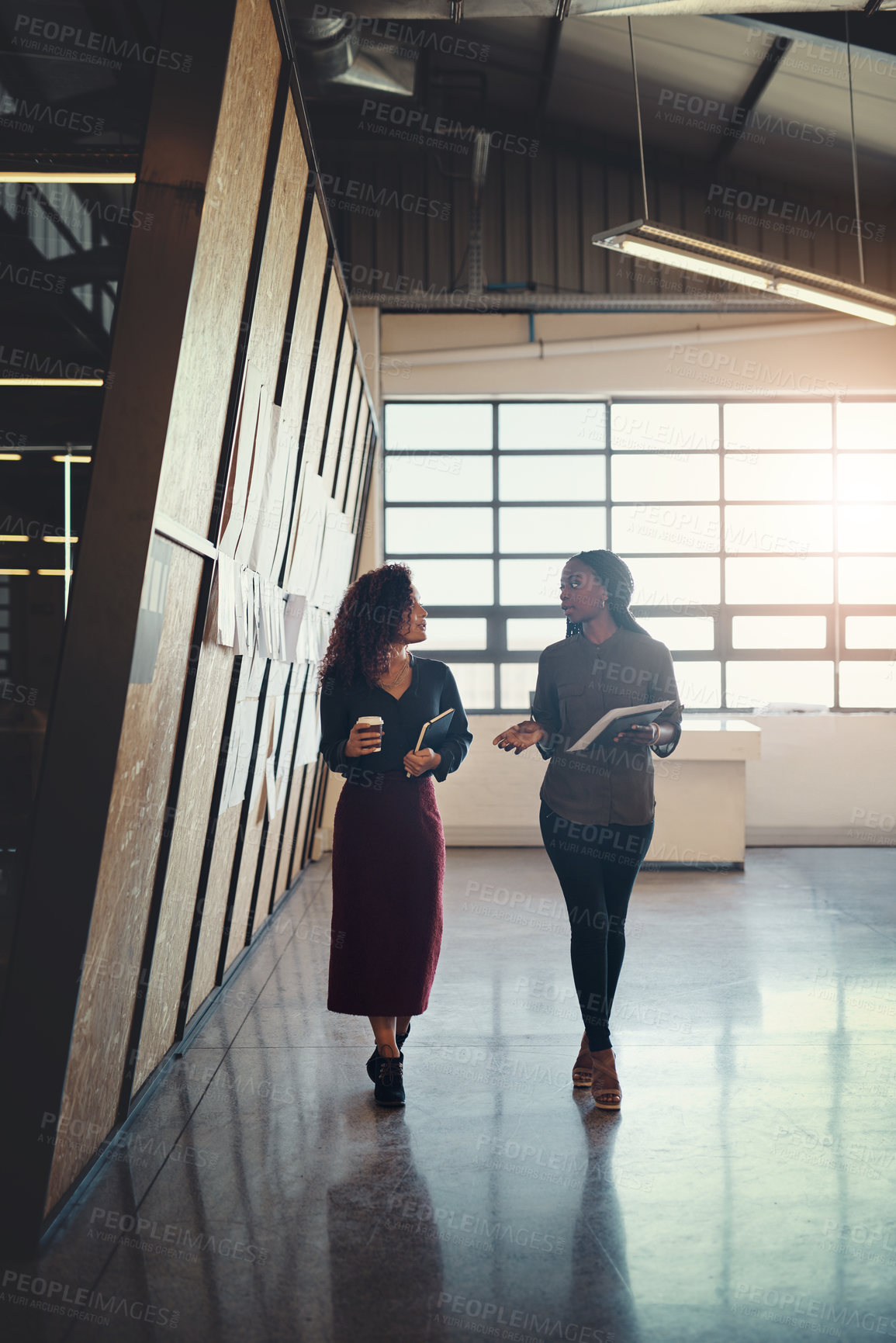 Buy stock photo Business people, coffee and walking in office for teamwork, research and planning project together. Startup, discussion and creative women with company partnership in workplace for media agency