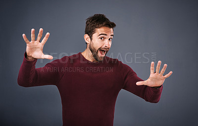 Buy stock photo Studio, excited and man with surprise, face and gossip of discount, wow and and rumor in mockup space. Gray background, portrait and person with shock, news and fear for phobia and scared with alert