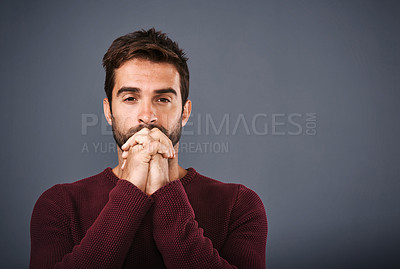 Buy stock photo Praying, portrait and man in studio for hope, wish or opportunity on gray background, Spiritual, religion and male person with hands together for worship, faith mindfulness or good news on mockup