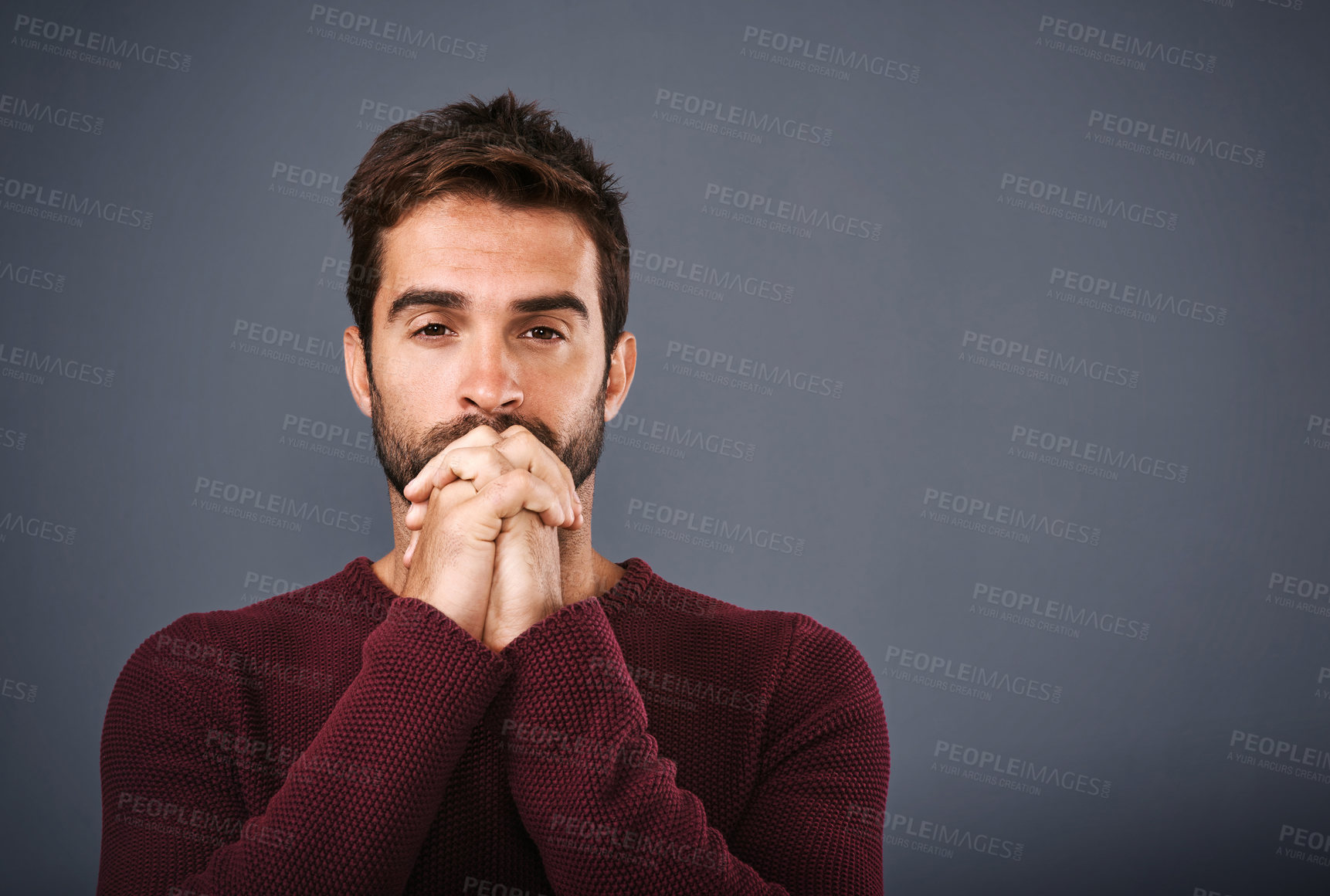 Buy stock photo Praying, portrait and man in studio for hope, wish or opportunity on gray background, Spiritual, religion and male person with hands together for worship, faith mindfulness or good news on mockup