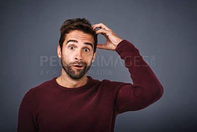 Buy stock photo Confused, worry and portrait of man in studio with doubt, scratch head and thoughtful on gray background. Thinking, mockup space and funny face of male person wonder for decision, choice and question