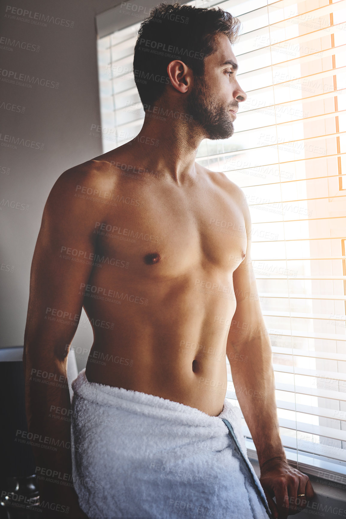 Buy stock photo Man, body and vision in home for day, grooming and self care with decision, towel and idea. Male person, thinking and planning in apartment for daily routine, schedule and getting ready by window