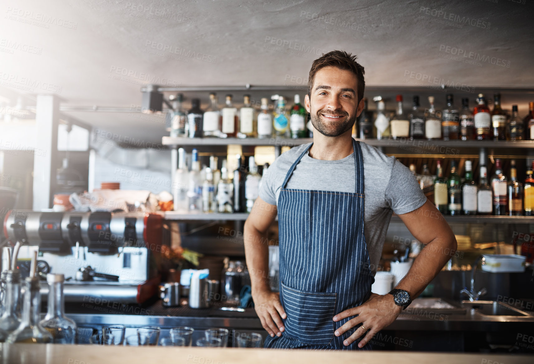 Buy stock photo Bartender, man and happy in portrait at counter with service for drinks, cocktails and liquor in restaurant. Person, barman and small business owner with glasses, ready and waiter for alcohol at pub