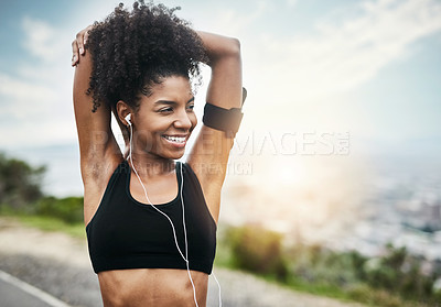 Buy stock photo Smile, woman and stretching arms for running outdoors with music for fitness, workout or cardio routine. Stretch, exercise and happy African female runner in nature with podcast for training run
