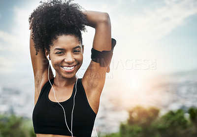 Buy stock photo Fitness, portrait and happy woman stretching outdoors with music for running, workout or cardio. Face, smile and African female runner in nature with podcast for training, motivation or sport routine