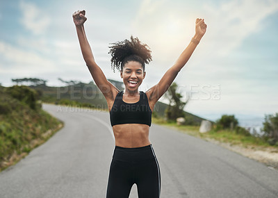 Buy stock photo Cropped portrait of an attractive young sportswoman cheering in celebration outside