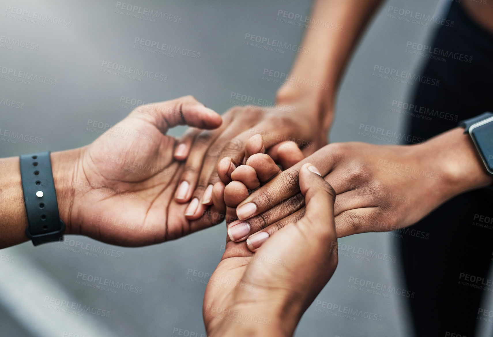 Buy stock photo High angle shot of an unrecognizable sporty young couple holding hands while standing outside