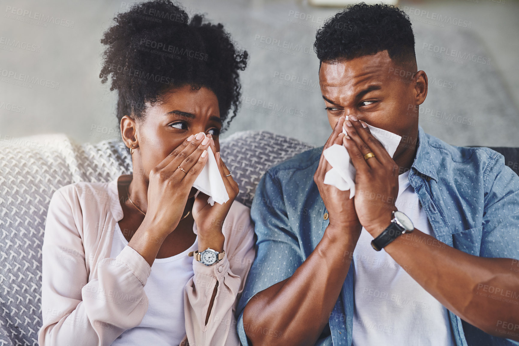 Buy stock photo Upset, sofa and black couple with tissue in home for allergies, hay fever and infection. Dating, sick and man and woman with handkerchief blowing nose for illness, flu and sinusitis in living room