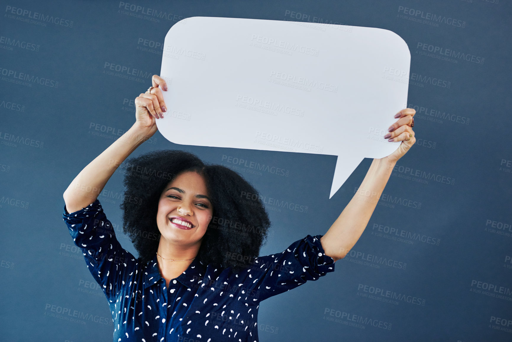 Buy stock photo Portrait, speech bubble and woman in studio with banner, news or announcement on blue background. Mockup, poster and happy female face with billboard for social media, advertising or branding launch