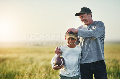 Buy stock photo Father, kid smile and rugby ball in a countryside field for bonding and fun in nature. Mockup, dad and young child together with happiness ready to start game outdoor on grass at farm with space