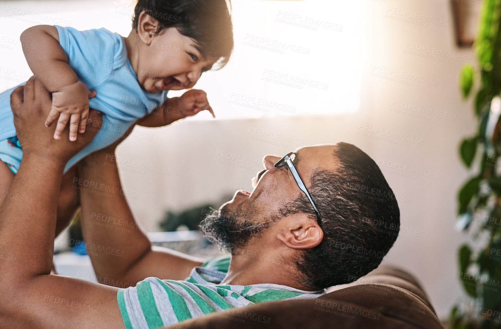 Buy stock photo Man, playing and baby laughing at house with airplane game, bonding and support for fantasy play on weekend. Excited, father and boy with love, trust and child motor or sensory development at home