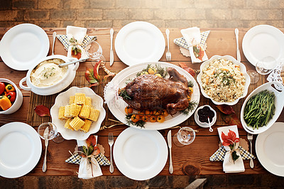 Buy stock photo High angle shot of a dining table all laid out for Thanksgiving
