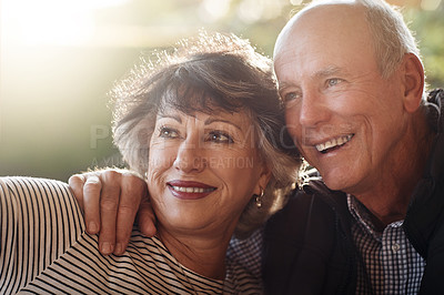 Buy stock photo Cropped shot of an affectionate senior couple taking a selfie while sitting outside