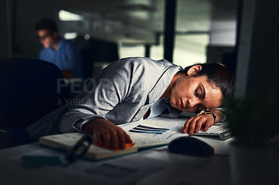 Buy stock photo Cropped shot of a young attractive businesswoman sleeping in the office