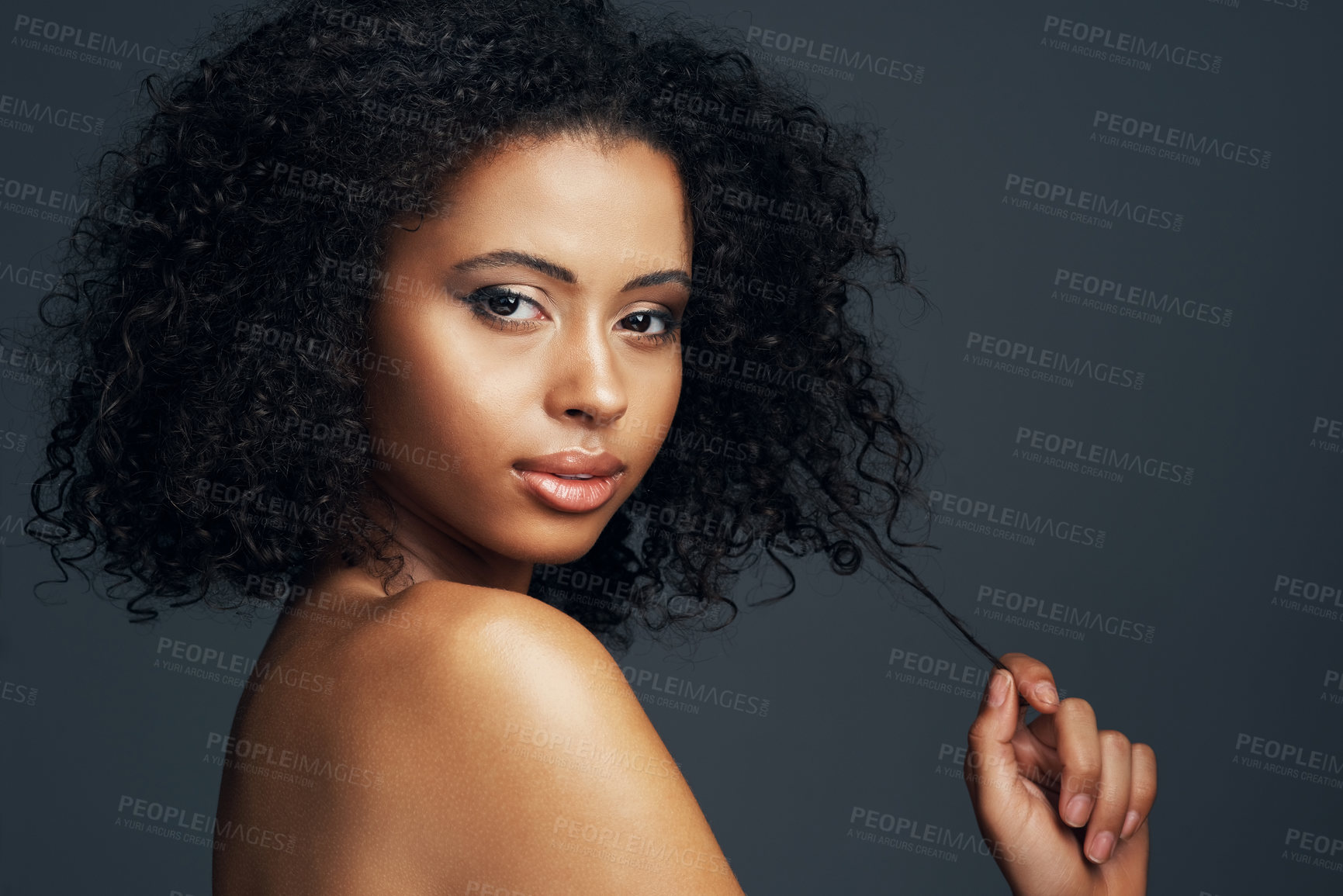 Buy stock photo Makeup, hair care and portrait of woman in studio for self care, beauty or cosmetics routine. Health, facial and female person from Jamaica with cosmetology and curly hairstyle by gray background.