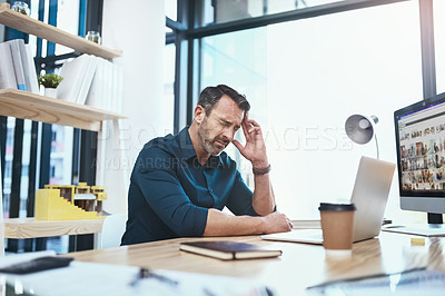 Buy stock photo Stress, headache and businessman with laptop in the office while working on a corporate project. Medical emergency, healthcare and mature male employee with a migraine and pain in the workplace.