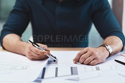 Buy stock photo Cropped shot of an unrecognizable male architect working on a design