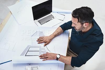 Buy stock photo Man, architect and drawing design for house renovation or project planning with draft, blueprint or floor plan. Male person, desk and creative engineering or building contractor, approval or home