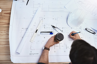 Buy stock photo Cropped shot of an unrecognizable male architect working on a design