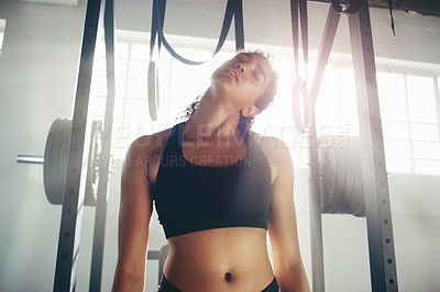 Buy stock photo Stretching, tired and sports with woman in gym for cardio, training and performance. Sweating, exhausted and workout with female athlete in fitness center for exercise, competition and strong