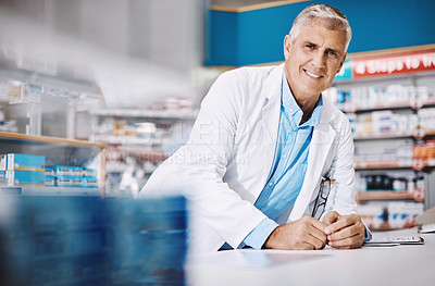 Buy stock photo Portrait, man and mature pharmacist with smile, drugs prescription or healthcare in pharmacy clinic. Professional, medical or proud chemist with confidence by counter of medication store dispensary