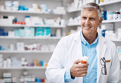 Buy stock photo Shot of a pharmacist working in a drugstore