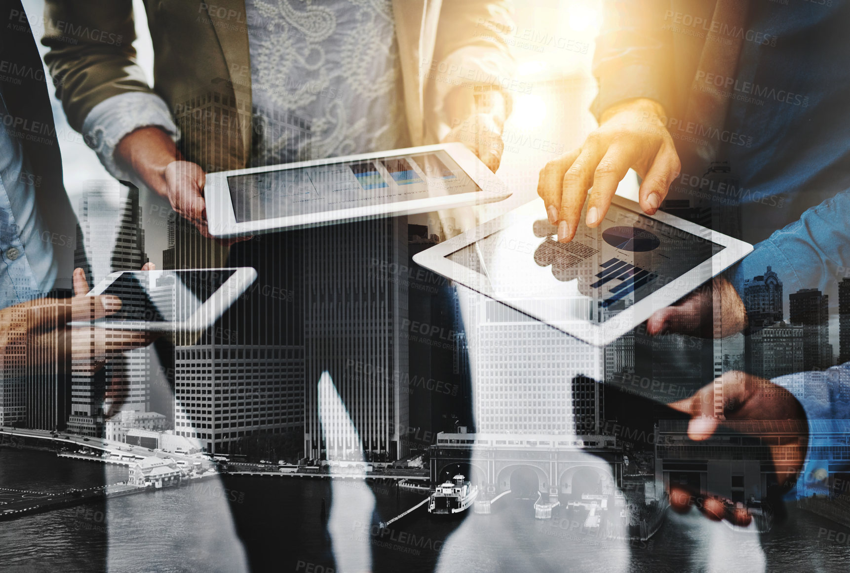 Buy stock photo Cropped shot of unrecognizable businesspeople using their wireless devices in the office