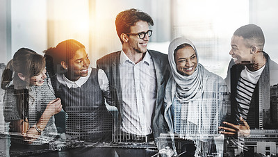 Buy stock photo Shot of a group of young cheerful businesspeople standing with arms around inside of the office at work during the day