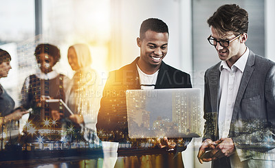 Buy stock photo Shot of a group of young cheerful businesspeople browsing on digital devices while working together in the office at work