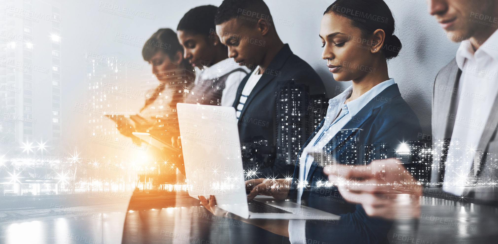 Buy stock photo Cropped shot of a group of young businesspeople waiting in line for their interviews