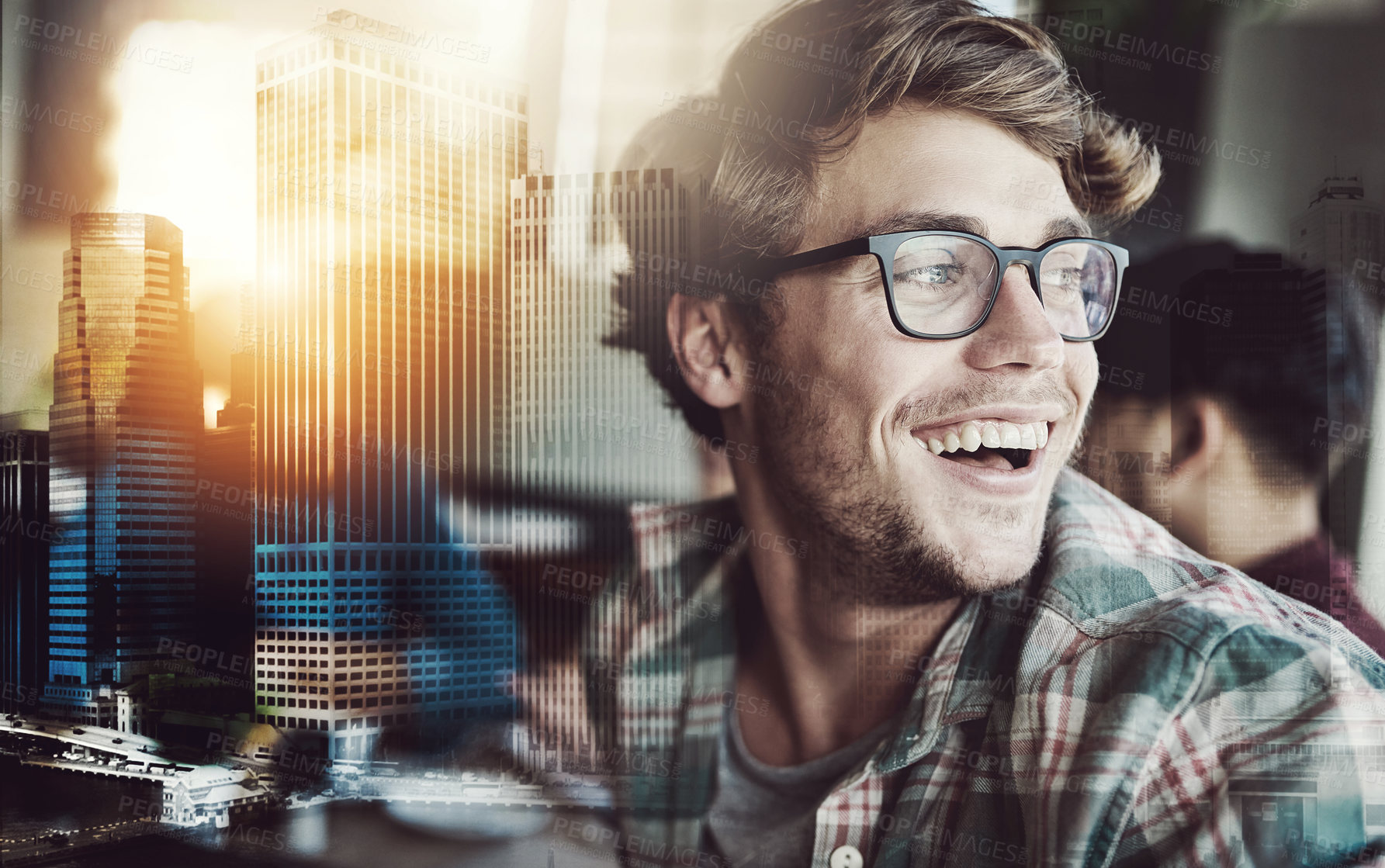 Buy stock photo Cropped shot of a smiling young man sitting at a cafe table with friends in the background