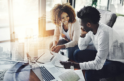 Buy stock photo Cropped shot of a young couple going through their paperwork together at home