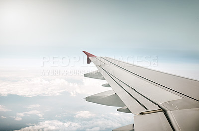 Buy stock photo Airplane, wing and outdoor in sky, flying and travel to California, international and journey for adventure. Transport, global and flight in air and jet to location, destination and aircraft