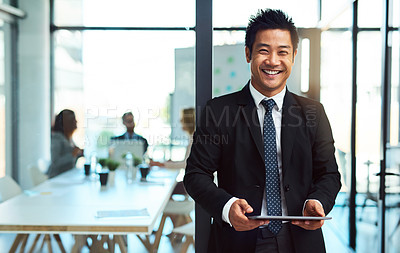 Buy stock photo Portrait, office and asian businessman with tablet in office or standing with confidence, pride and happiness in corporate workplace. Man, manager or professional worker or employee with technology 