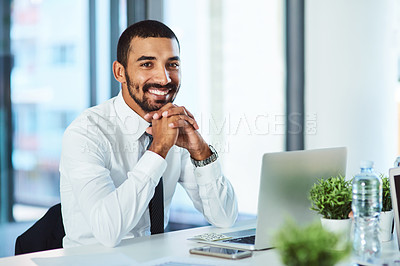 Buy stock photo Portrait of a handsome young businessman in the workplace