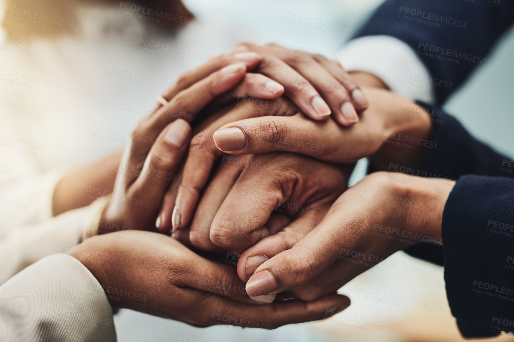 Buy stock photo Business people holding hands for support, motivation and comfort together at work. Closeup of group of professional employees, colleagues and workers joining hands for help, consoling and community